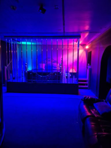 Bed on a stage at Hellfire